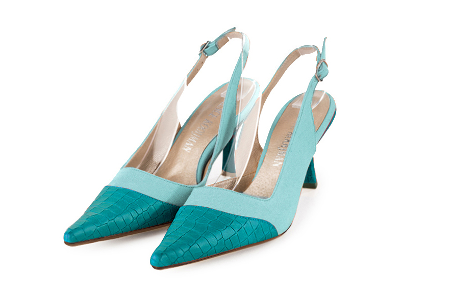 French elegance and refinement for these turquoise blue dress slingback shoes, 
                available in many subtle leather and colour combinations. For fans of a quirky "Rock" style pointed toe.
To be personalized or not with your materials and colors.  
                Matching clutches for parties, ceremonies and weddings.   
                You can customize these shoes to perfectly match your tastes or needs, and have a unique model.  
                Choice of leathers, colours, knots and heels. 
                Wide range of materials and shades carefully chosen.  
                Rich collection of flat, low, mid and high heels.  
                Small and large shoe sizes - Florence KOOIJMAN